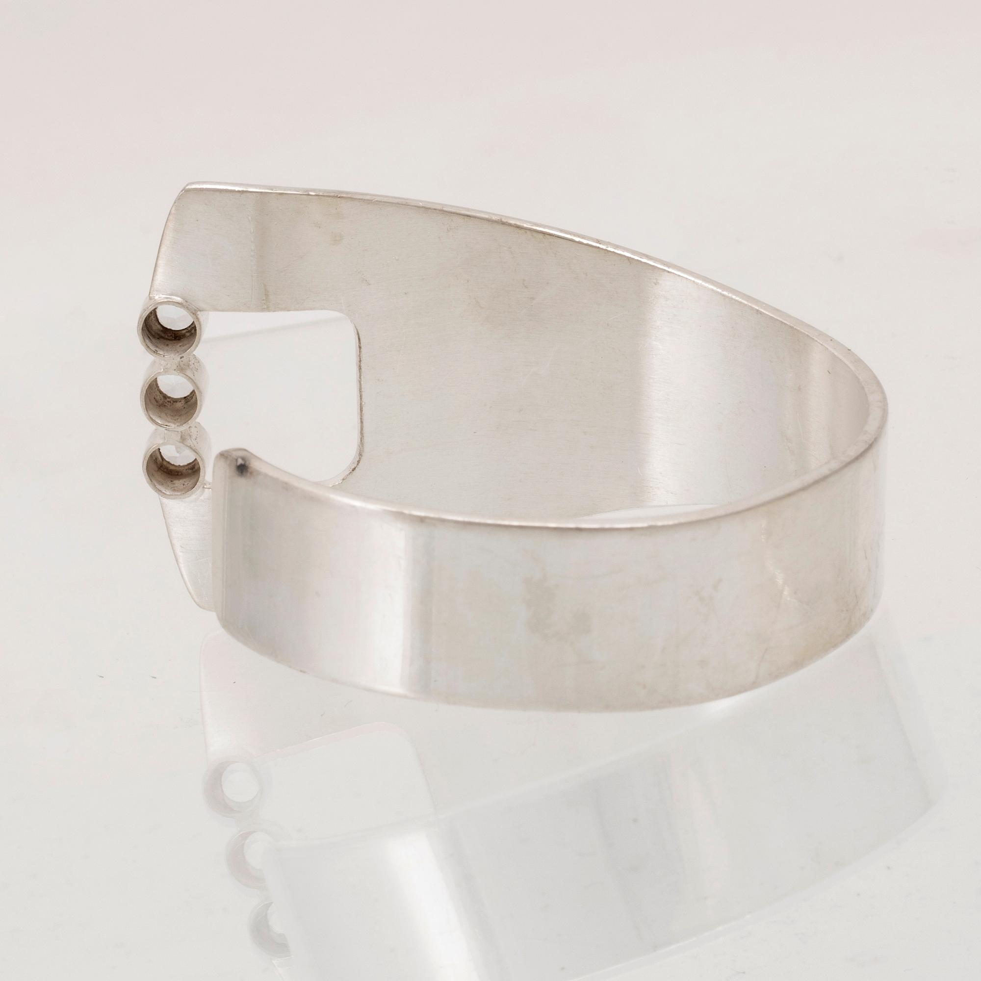 Per Dåvik a silver bracelet set with round brilliant-cut colorless synthetic spinels Alton Falköping 1973.