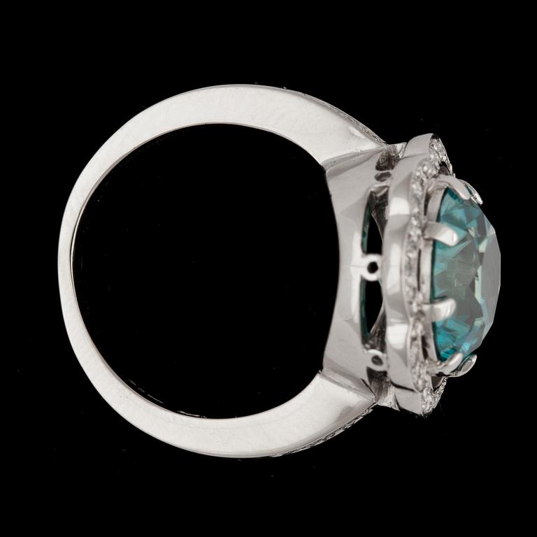 A blue zircon and brilliant cut diamond ring.