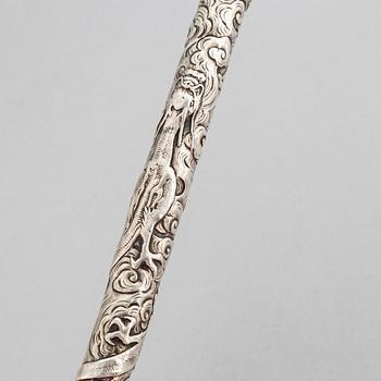 A Japanese silver opium pipe, Meiji period (1868-1912).