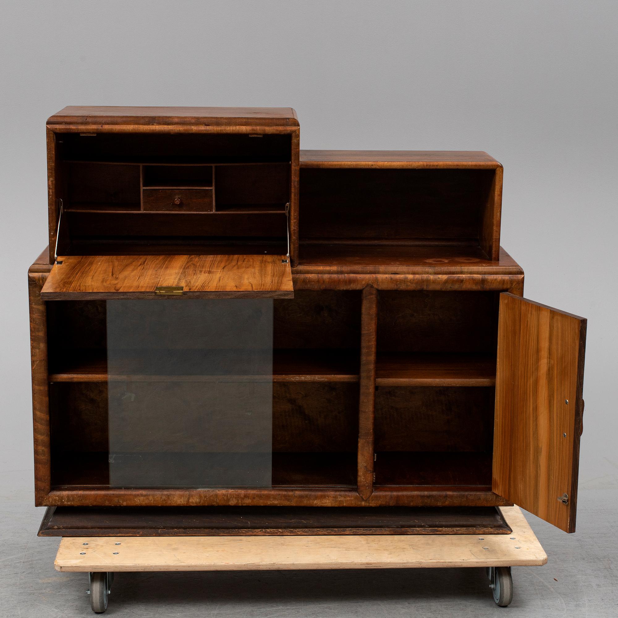 A walnut veneered cabinet, 1930's.