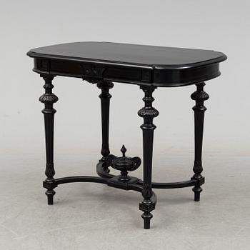 A set of three chairs, two easy chairs, one sofa and one table, end of the 19th century.