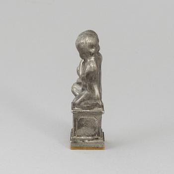 A Firma Svenskt Tenn pewter and brass seal, probably second quarter of the 20th century.