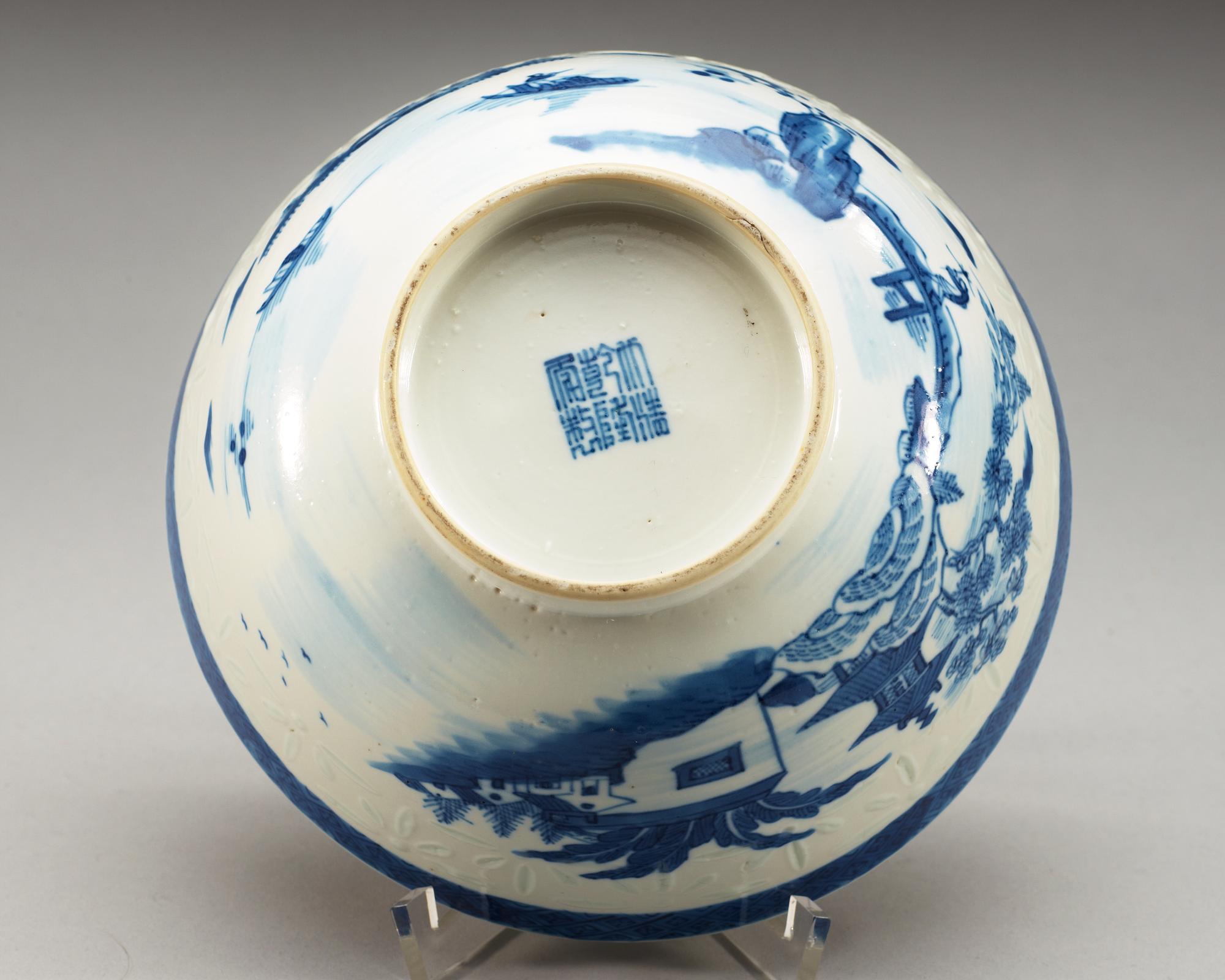 A blue and white bowl, Qing dynasty, 19th Century with Qianlong seal mark.