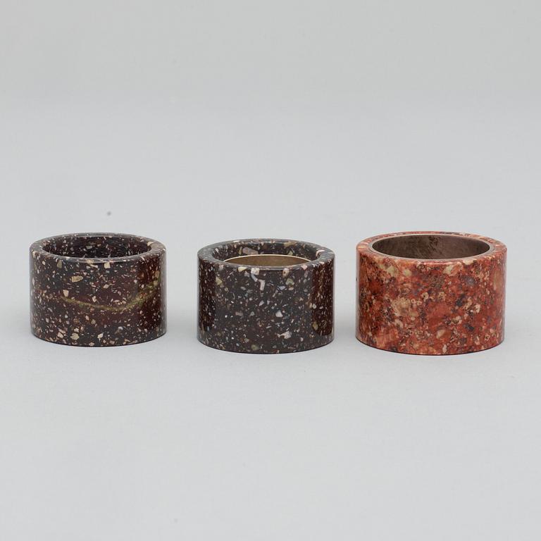 Three Swedish porphyry 20th century napkin rings.