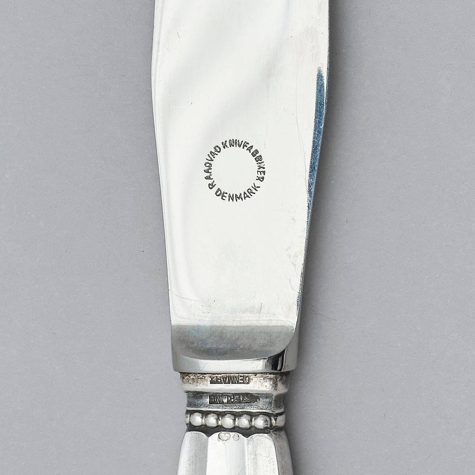 Georg Jensen, a set of 139 pieces of  'Acorn' sterling silver and stainless steel flatware, design Johan Rohde, Copenhagen after 1945.