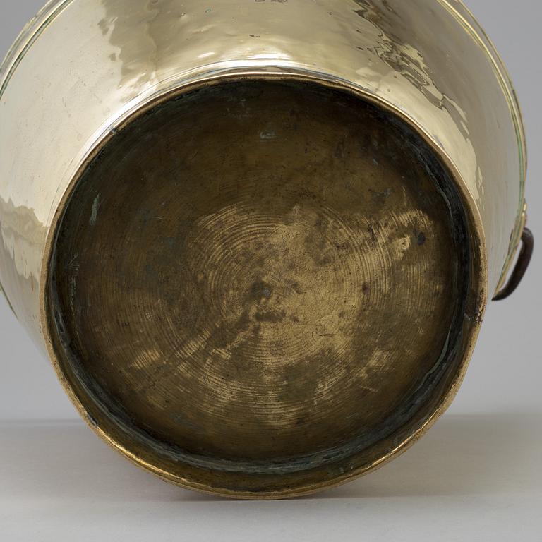 A 18th century brass bucket.