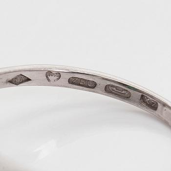 RING, fasettslipad turmalin, åttkantslipade diamanter, 18K vitguld. A. Tillander, Helsingfors 1975.