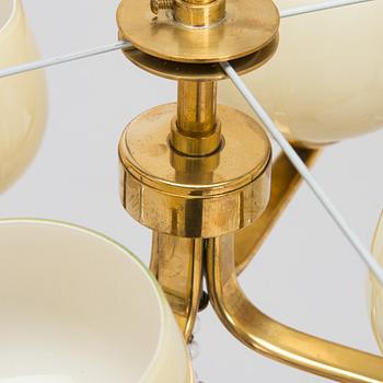 Paavo Tynell, kattovalaisin, malli 1359/4 Taito 1900-luvun puoliväli.