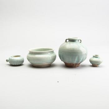 A group of four pale green glazed vessels, South East Asia, presumaby Sukothai, 14th/16th Century.