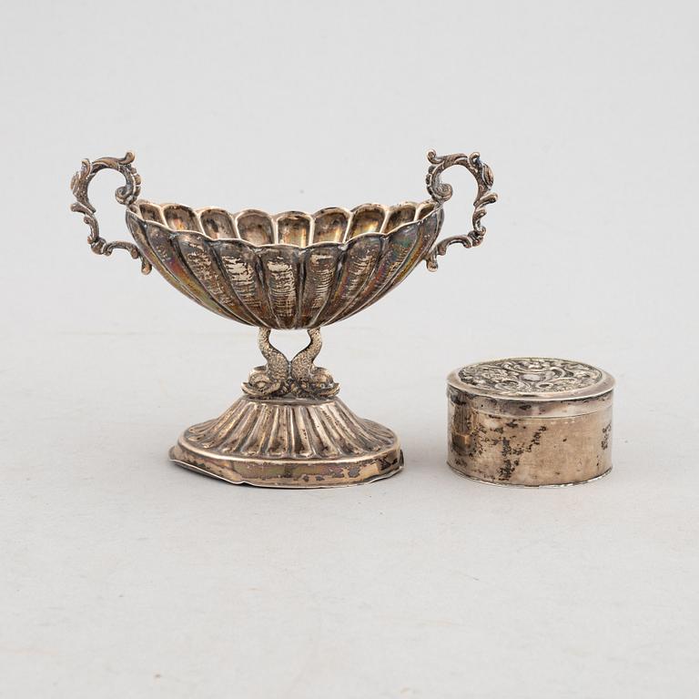 Goblet on foot, hand mirror, and box, silver.