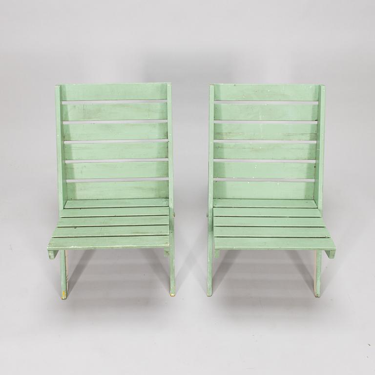 A pair of mid-20th century garden chairs.