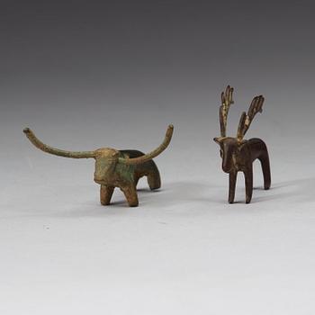 Two bronze figures in the shape of a bull and a stag, presumably Scythian, about 700 B.C. - 200 A.D.