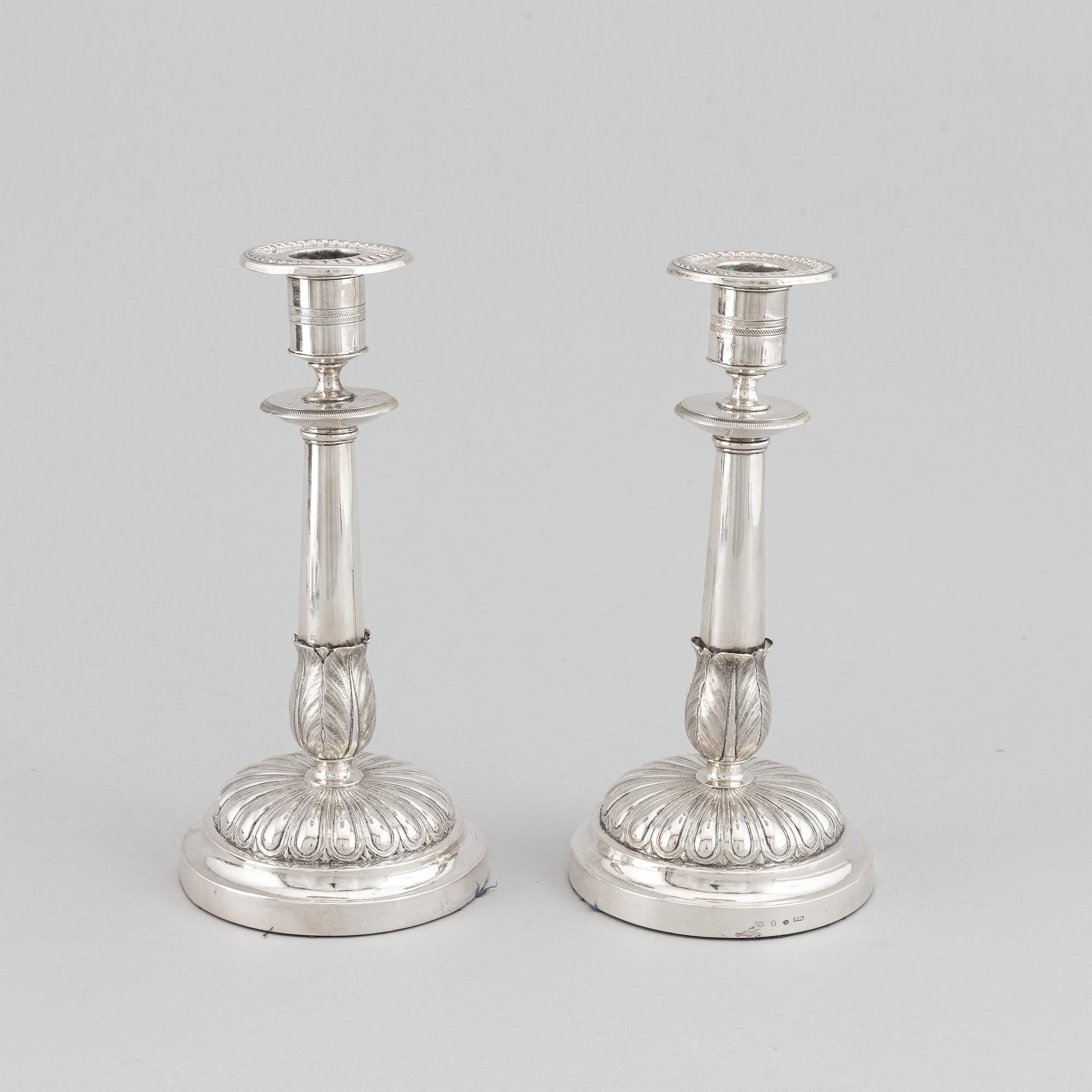 Gustaf Möllenborg, a pair of silver empire candlesticks, Stockholm 1829.