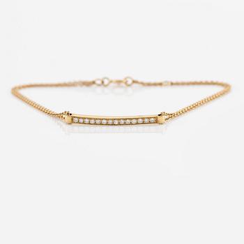 Armband, 18K guld med små briljantslipade diamanter.
