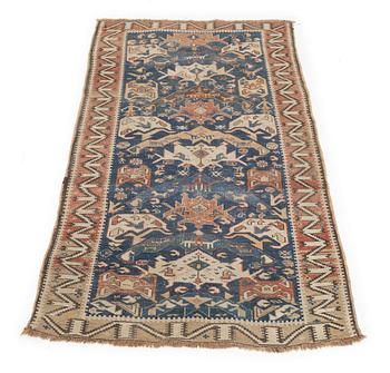 An oriental rug, c. 200 x 115 cm.