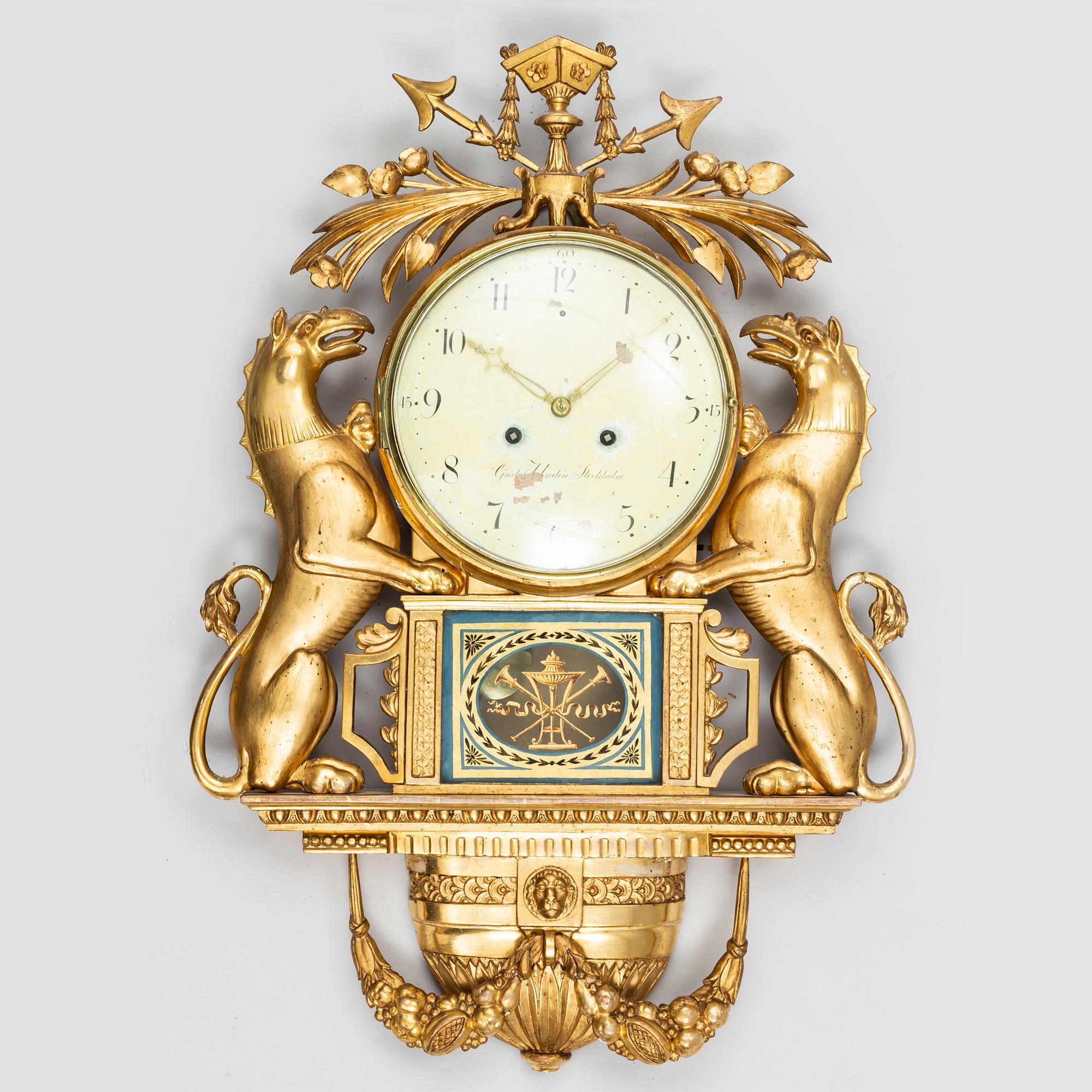 A Swedish Empire wall clock by G Undén (Stockholm 1800-1829).