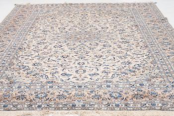 An oriental carpet, circa 378 x 282 cm.