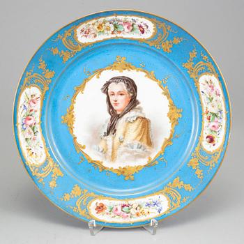 A pair of French porcelain plate, one with Sevrès like mark, early 20th century.