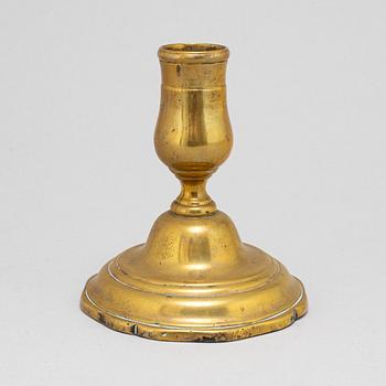 An 18th century candlestick.