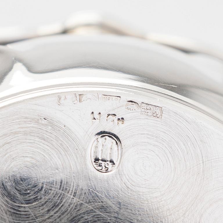 Two miniature beakers and a butter pan, Copenhagen, 1950s, and a silver-plated bottle coaster.