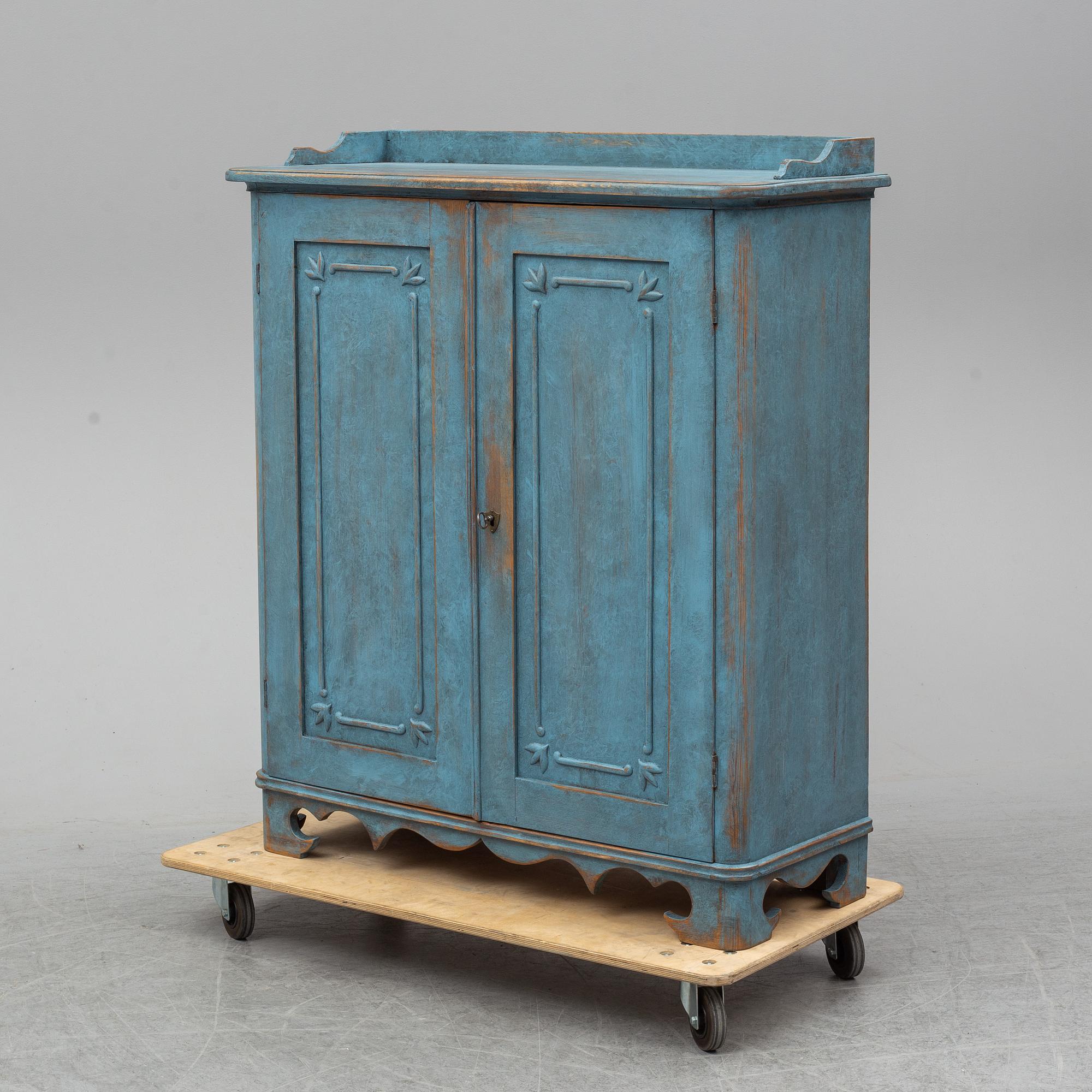 A mid 19th century painted cupboard.
