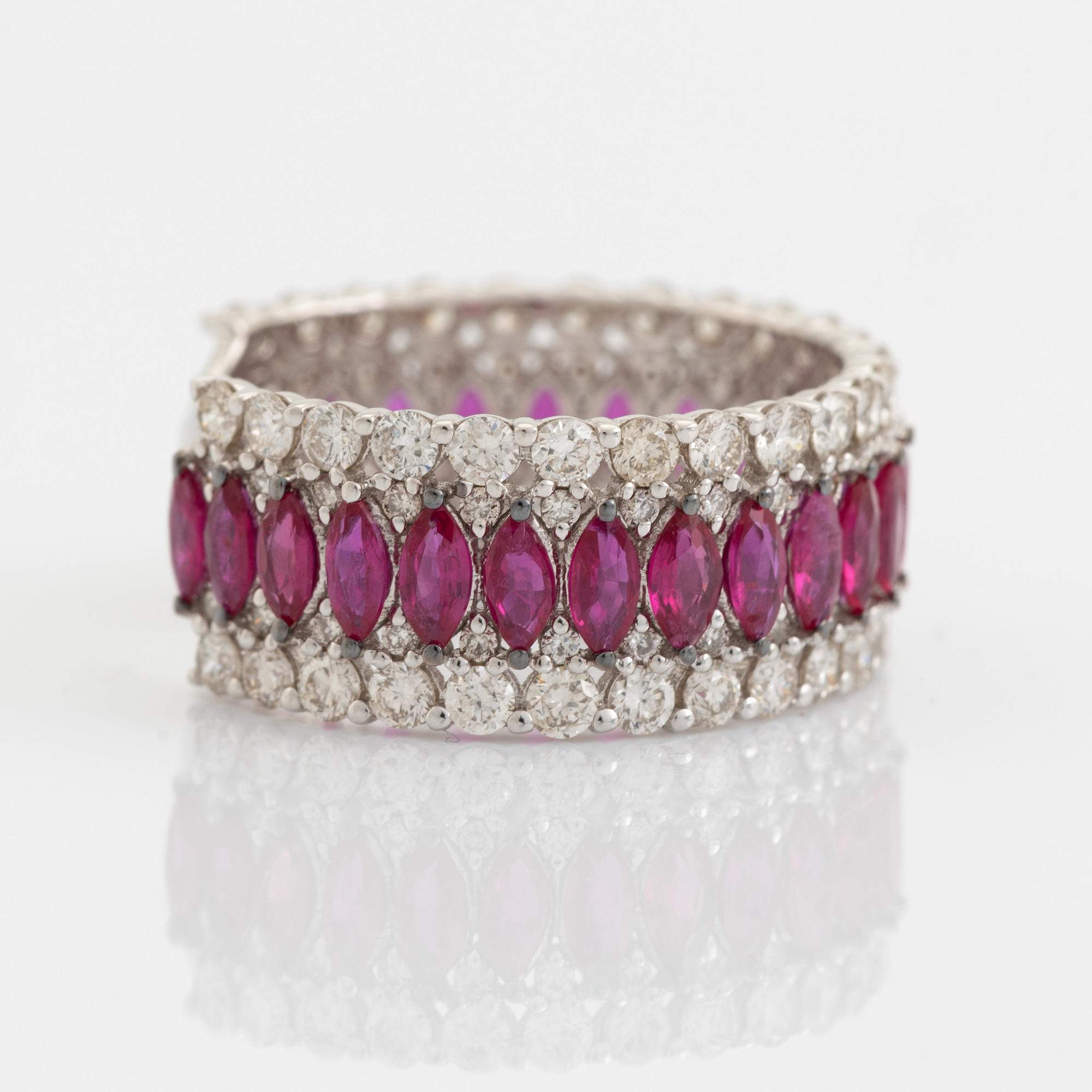 Navette ruby and brilliant cut diamond ring.