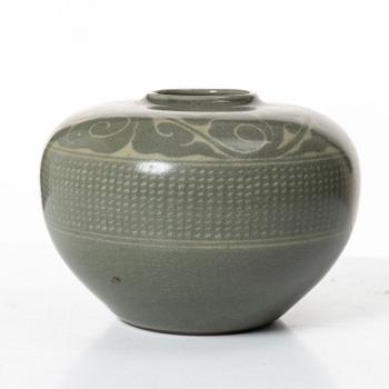A Korean celadon glazed ceramic vase, 1900s.