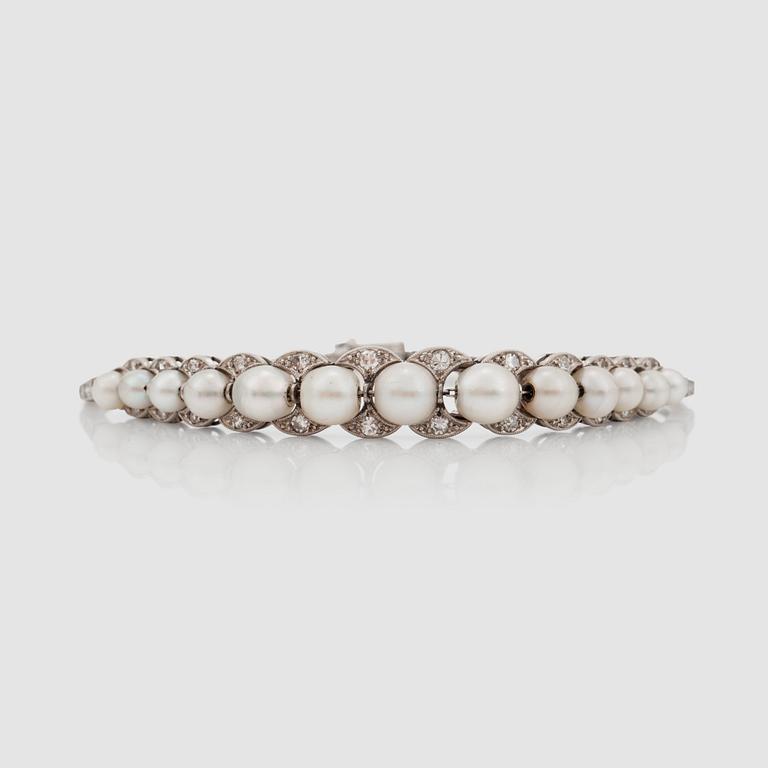 A natural pearl and old-cut diamond bracelet. In a box from David Andersen.
