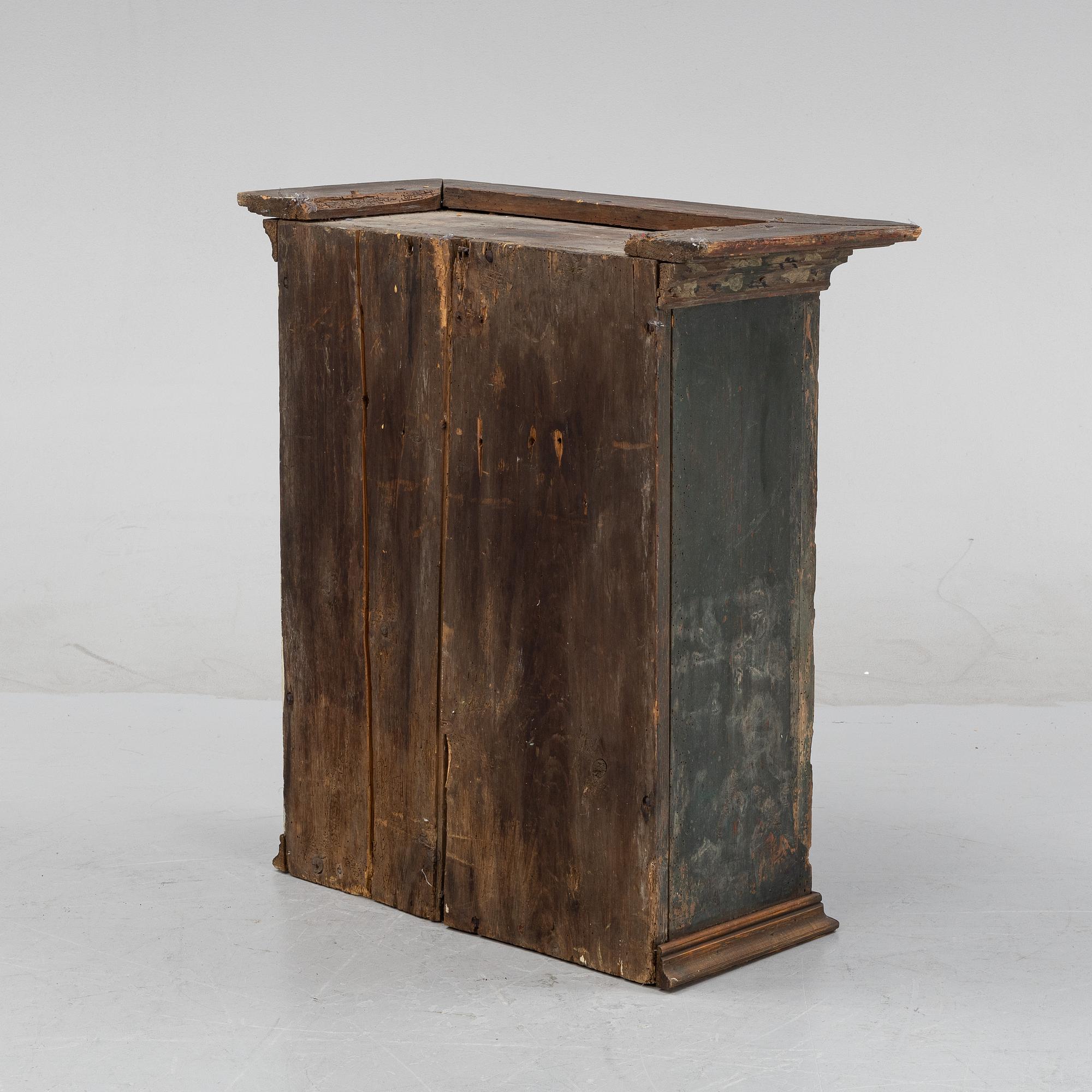 A Swedish provincial wall hanging cabinet, 1833.