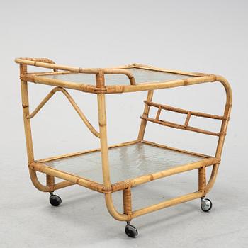 A second half of the 20th century rattan drinks trolley.