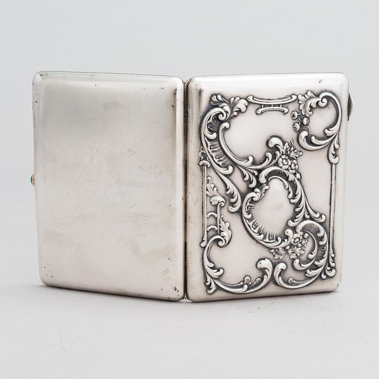 A Russian silver cigarette case, maker's mark of Mikhail Tarasov, Moscow 1908-14.