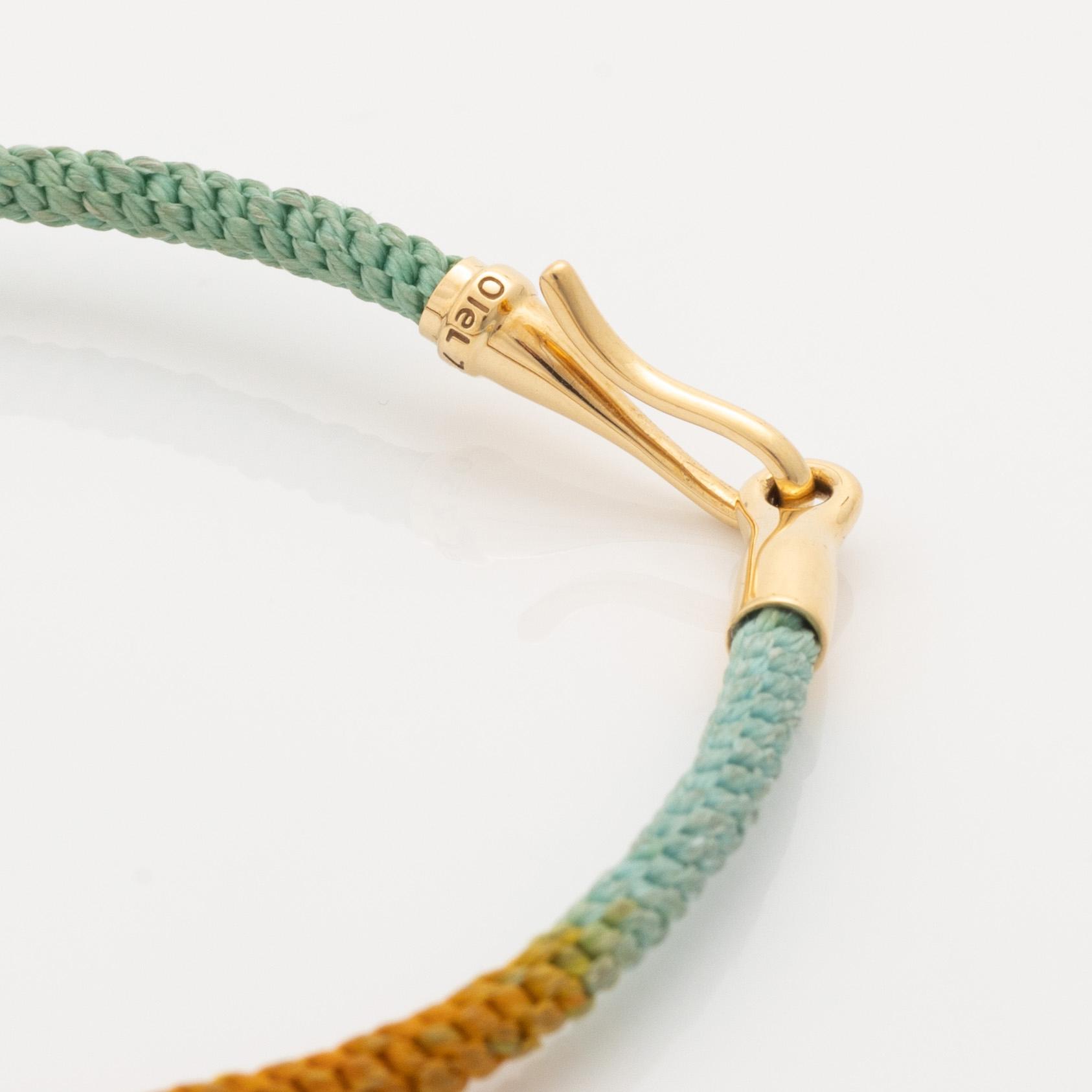 Ole Lynggaard, "Life bracelet", armband textil, spänne i guld, 18K.