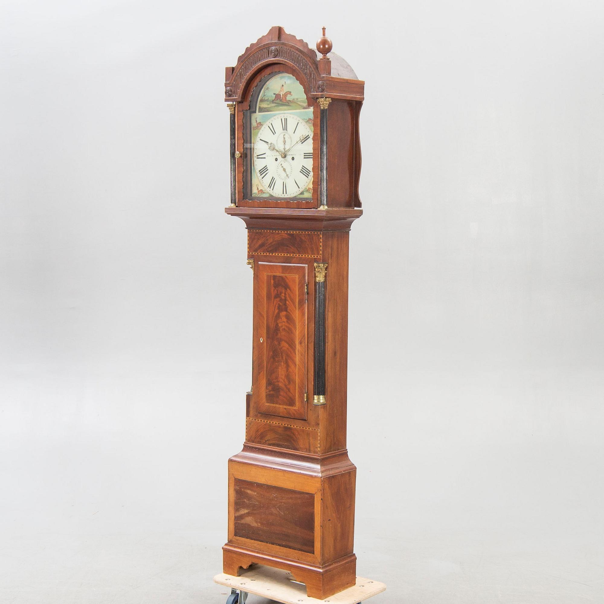 An English W Wilson Newcastle mahogany grand father clock first half of the 19th century.
