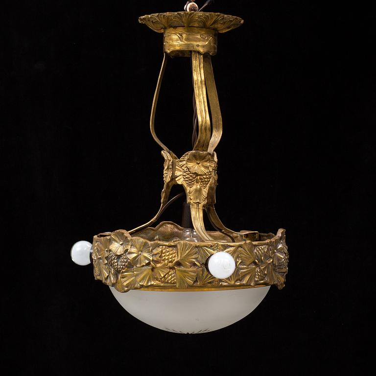 An Art Nouveau bronze ceiling light, Böhlmarks, 1907-24.