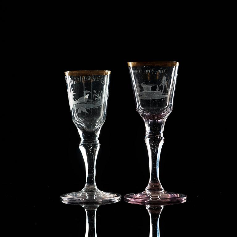 Two Silesian cut, engraved and gilded wine glasses, 1760's.