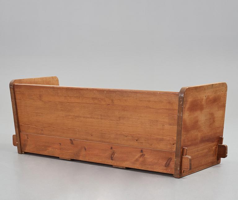 Axel Einar Hjorth, a stained pine "Lovö" sofa, Nordiska Kompaniet, Sweden 1930's.