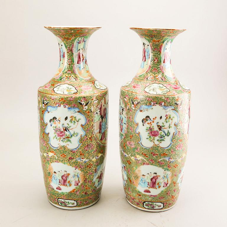 A pair of Chinese kanton vases later part of the 19th century porcelain.