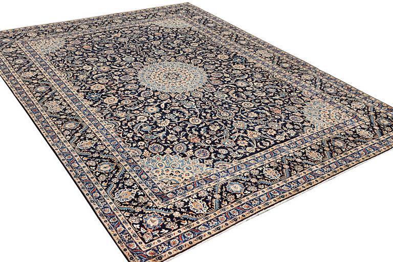 A Keshan carpet, c. 392 x 290 cm.