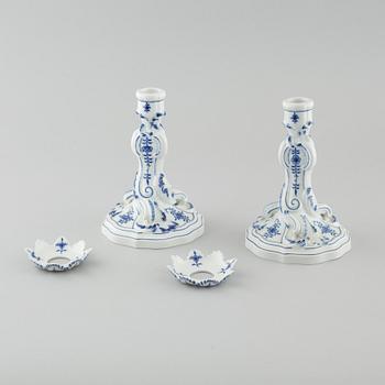 A pair of porcelain candle sticks by Meissen, second half of the 20th century.