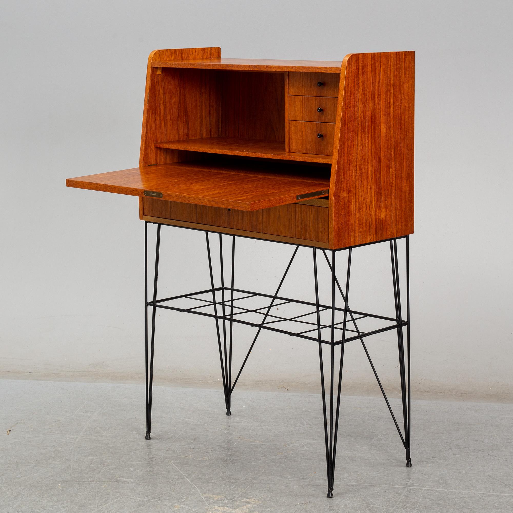 A Swedish teak veneered 'Bang' secretaire, circa 1960s, from Ikea.