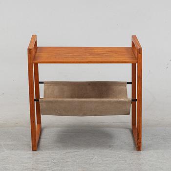 Kai Kristiansen, a teak and suede table.  Sika Møbler, Denmark.