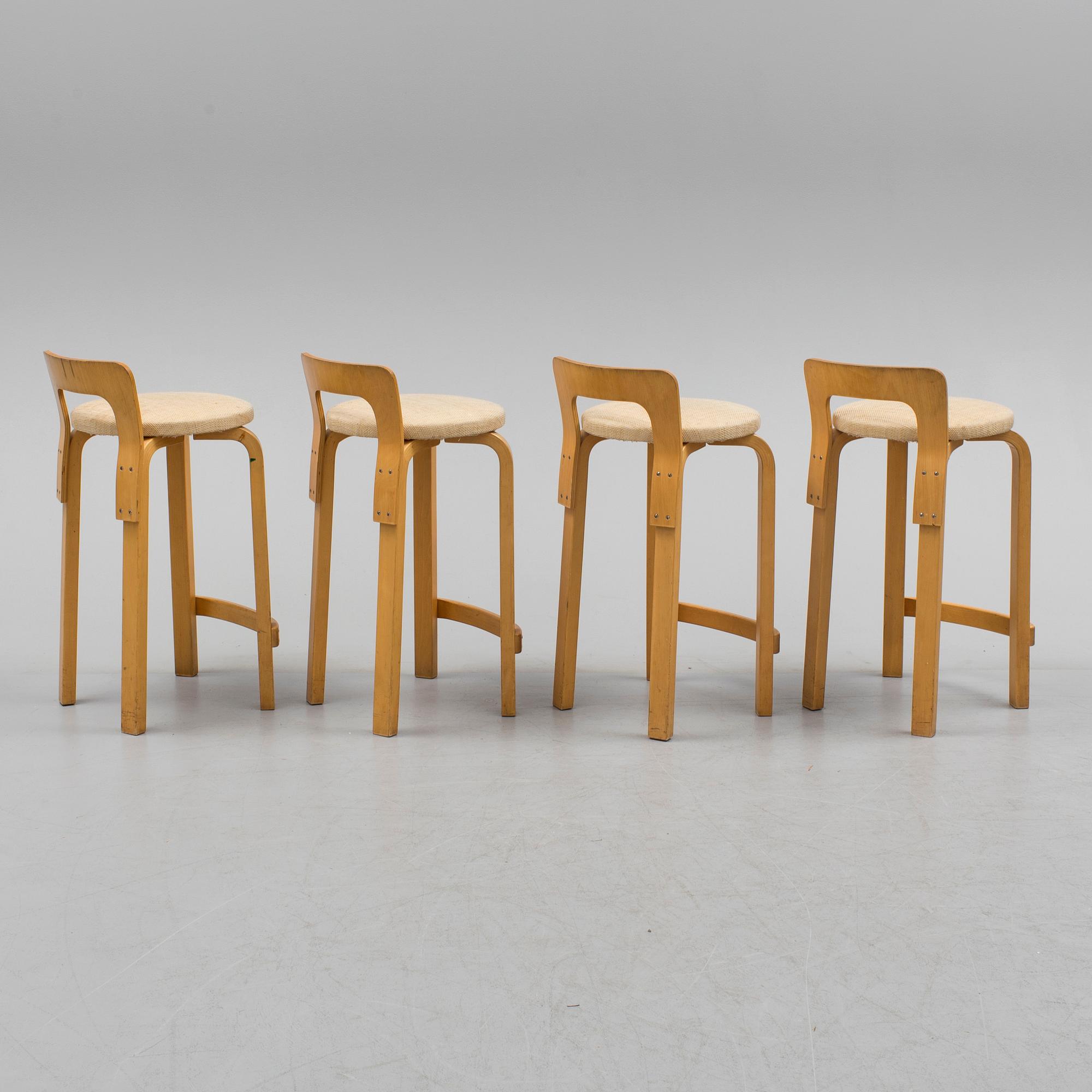 Four model K 65 bar stools by Alvar Aalto for Artek, Finland.