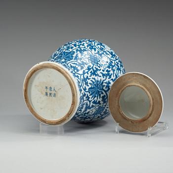 A blue and white jar with cover, Qing dynasty, 19th Century with Kangxi six character mark.