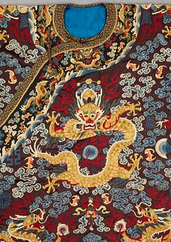 A Chinese embroidered silk robe, late Qing dynasty, circa 1900.