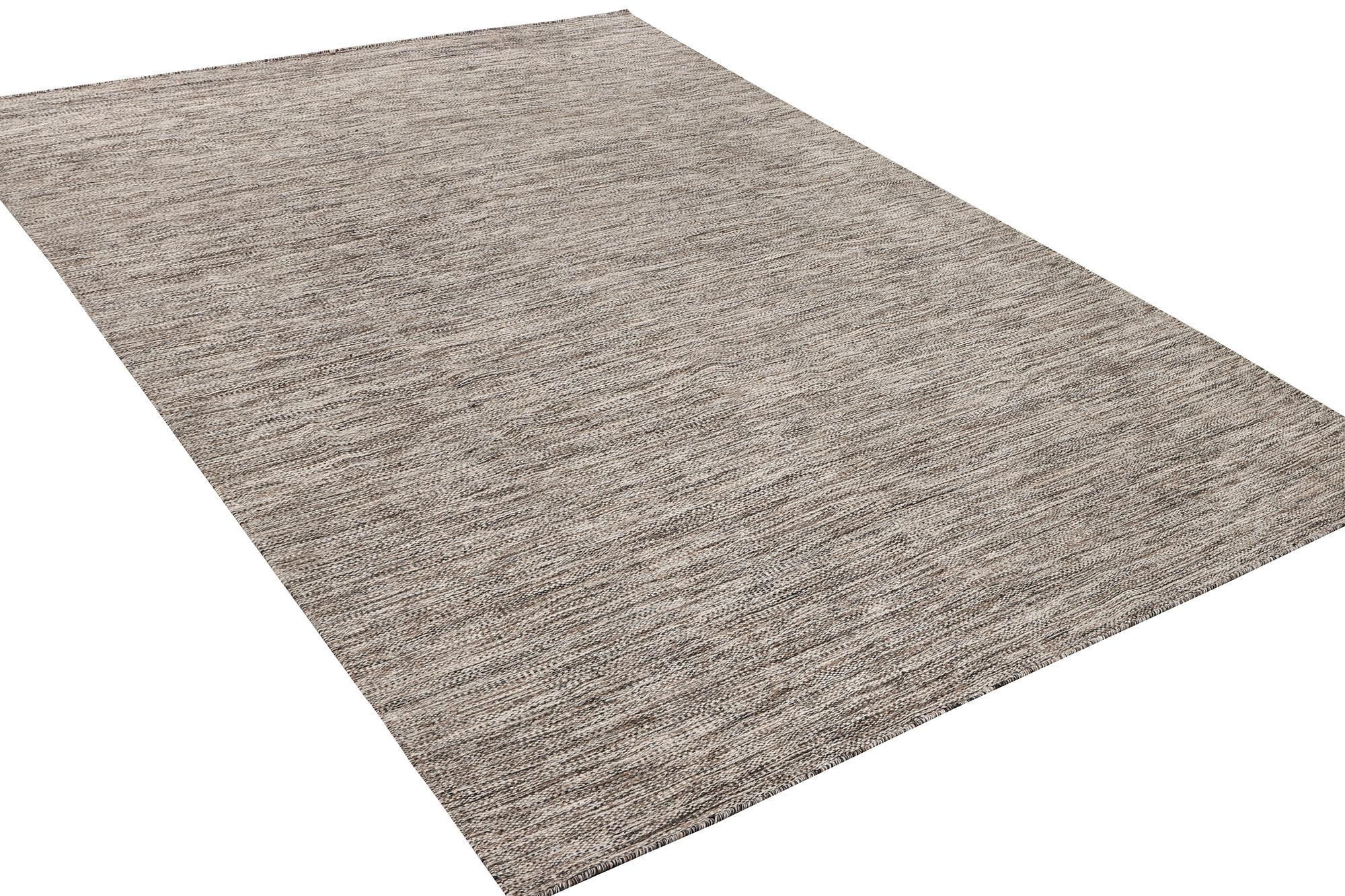 A flat weave carpet, c. 337 x 328 cm.