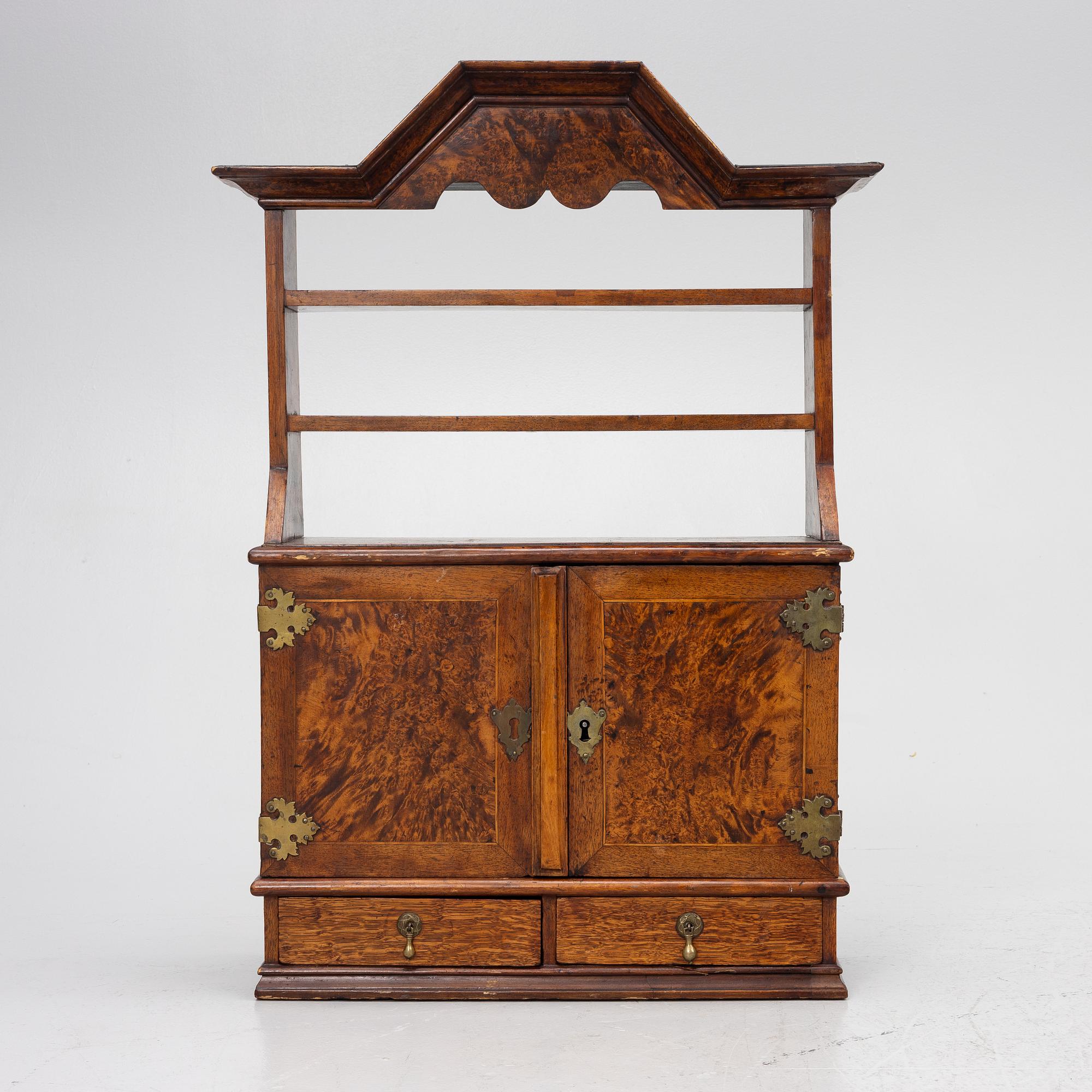 A late Baroque wall cabinet with shelves, first half of the 18th century.