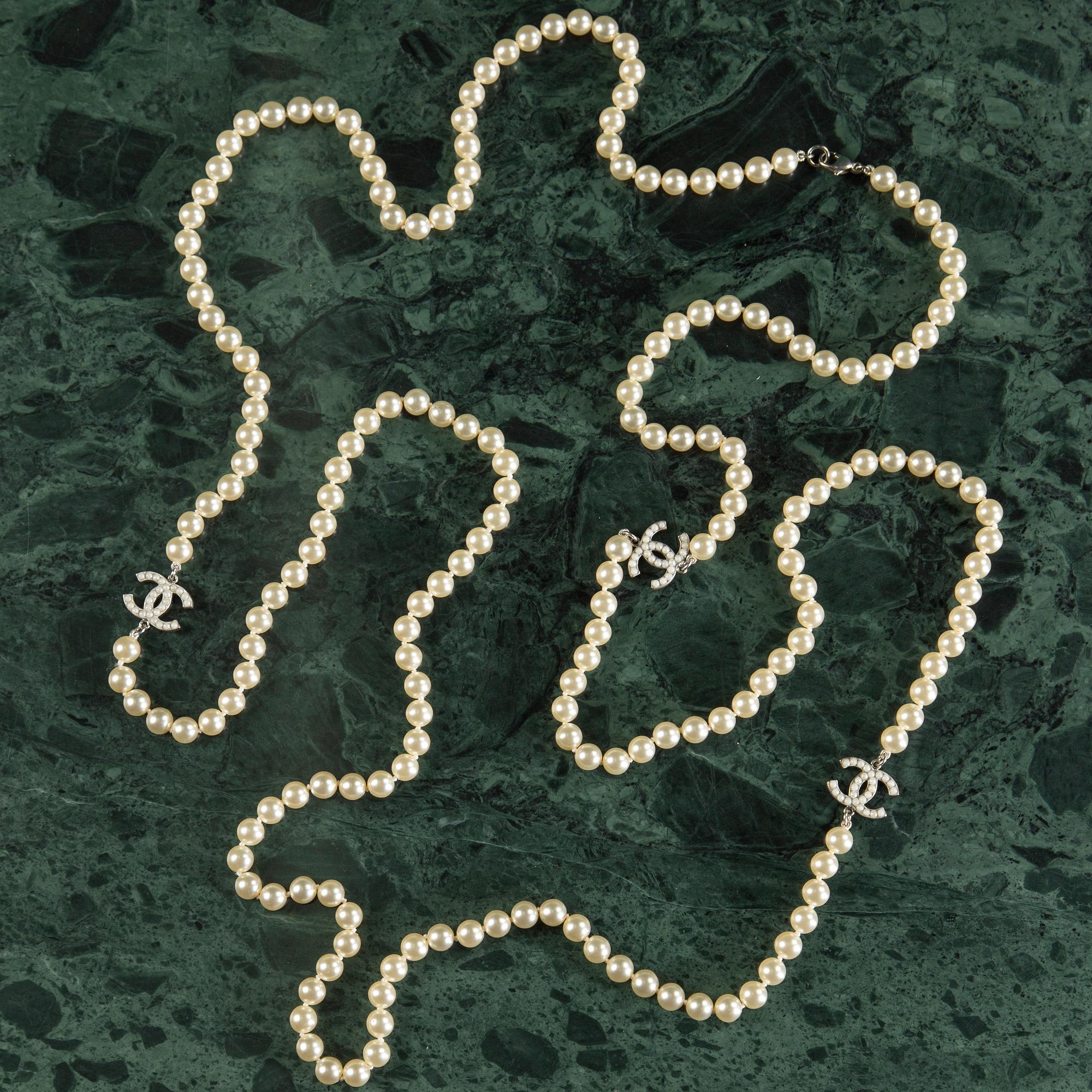 Necklace by Chanel.