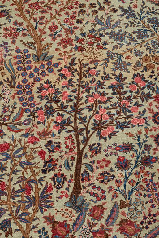 A CARPET, a semi-antique Tabriz probably, ca 393 x 284 cm.