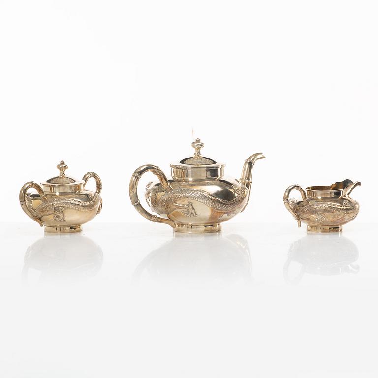 A three-piece Chinese silver tea service, Shanghai, early 20th Century.