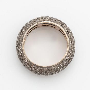 Silver and diamond ring.